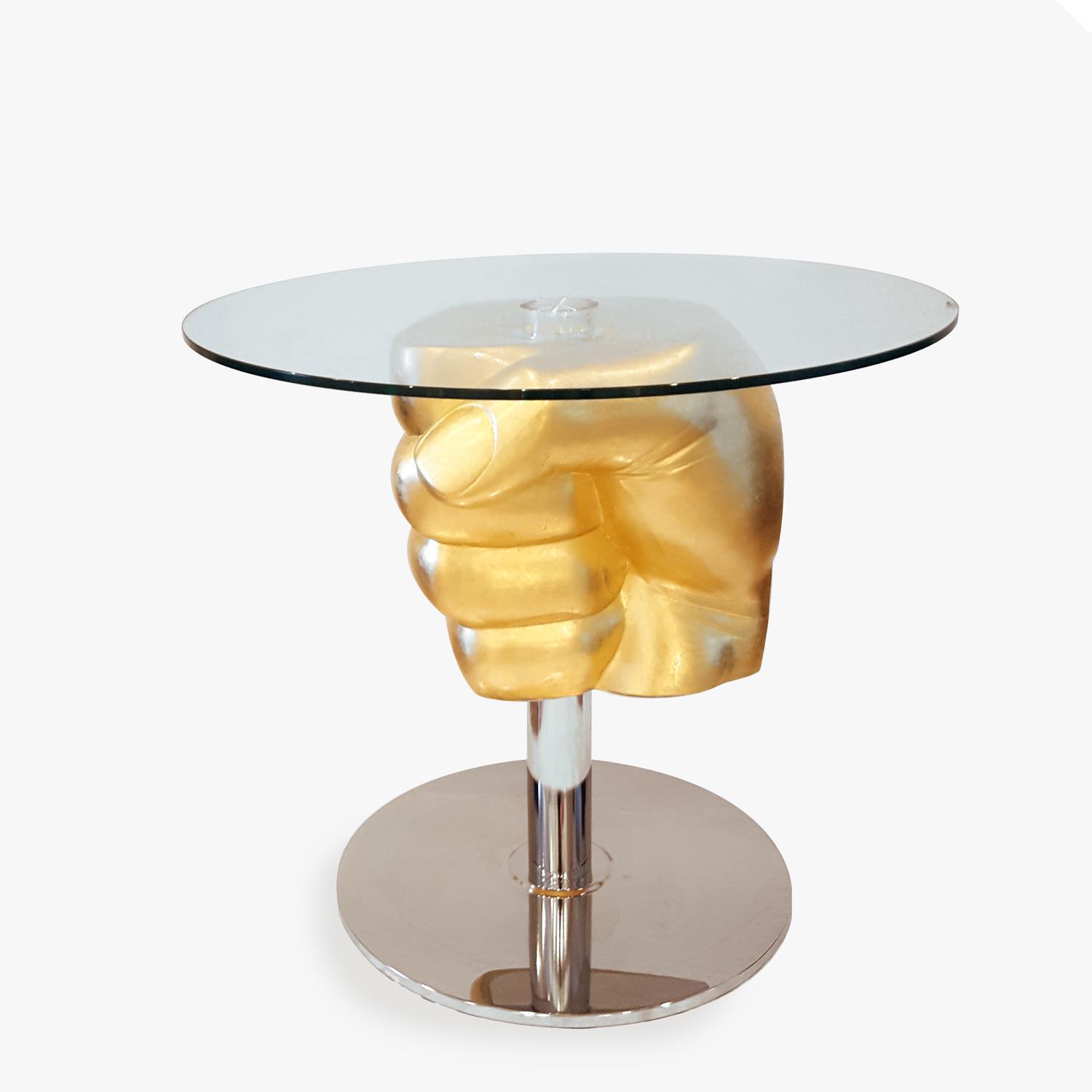 Tavolo Fist di Cleto Munari, tavolo scultura di design italiano in metallo lucido e forme artistiche contemporanee The Fist table by Cleto Munari is a unique sculptural piece of furniture. An icon of contemporary Italian design, crafted from fine materials and distinguished by the master’s unmistakable style. Perfect for collectors and art lovers.