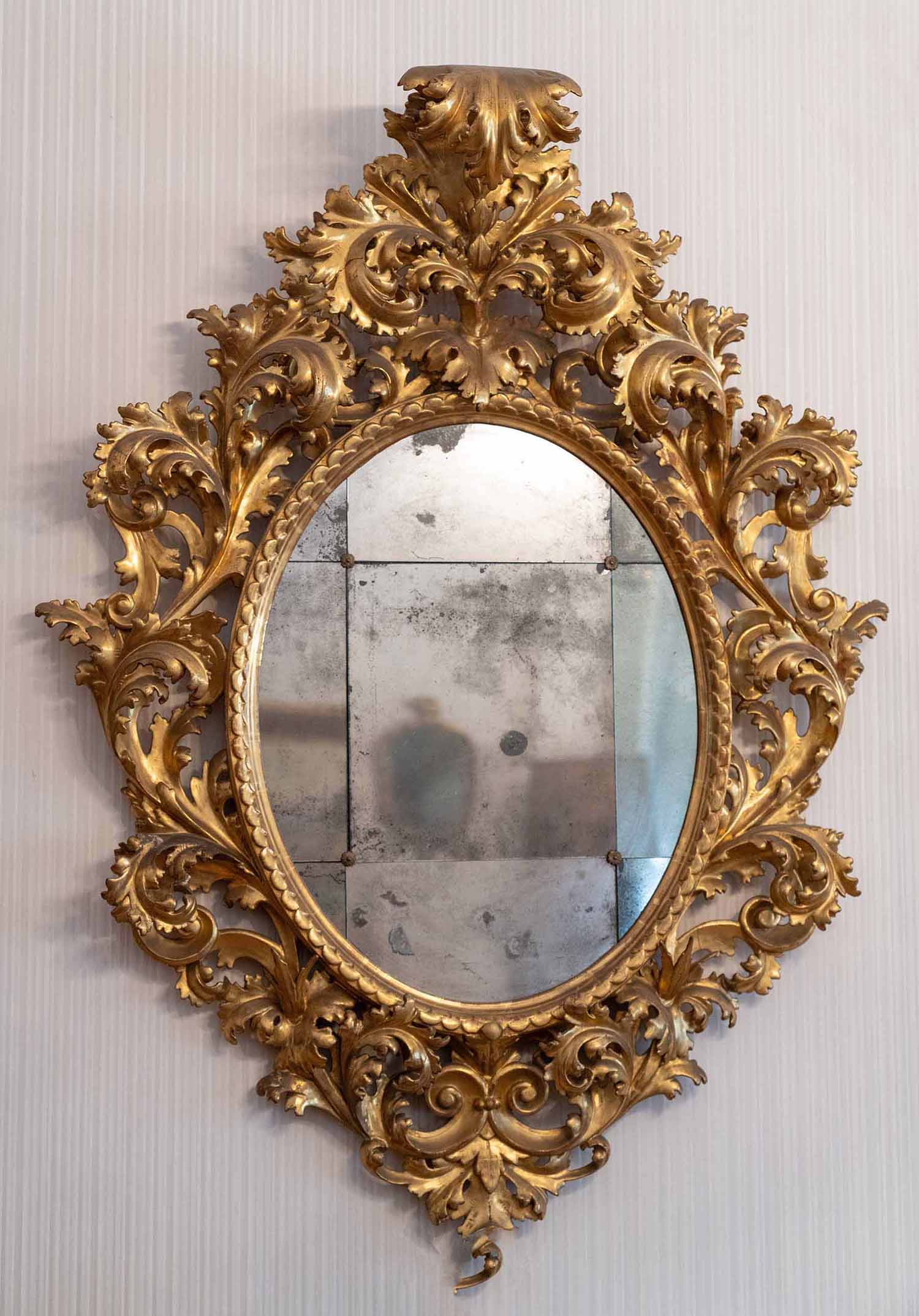 Specchiera toscana del XIX secolo in legno intagliato e dorato