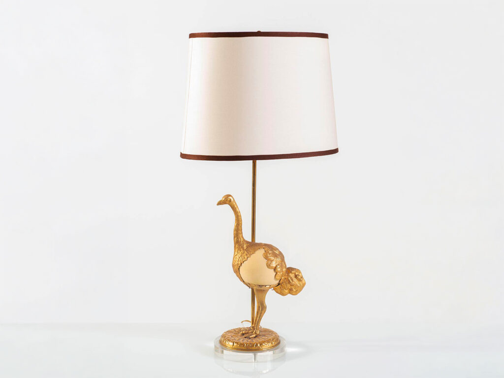 Rare Gabriella Crespi "Ostrich" table lamp in gilt metal featuring an ostrich egg, circa 1970.