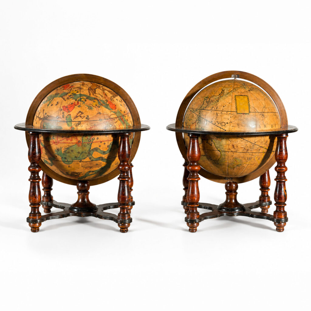 Pair of celestial and terrestrial globes by Giovanni Maria Cassini on wooden stands, Rome, 19th century.