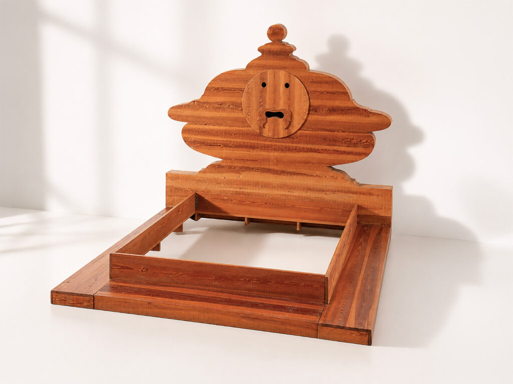 Mario Ceroli per Poltronova, letto matrimoniale "La Bocca della Verità" in massello di pino russo, 1972.
