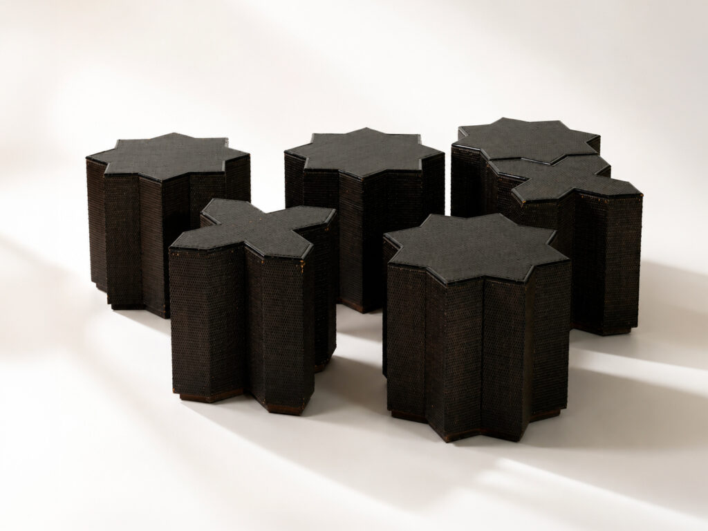 Vivai del Sud, sei tavolini modulari in canna e rattan nero intrecciato, Italia, anni Settanta.